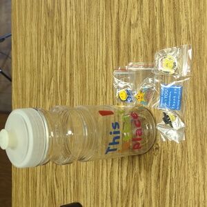 Walmart Water Bottle and employee Pins